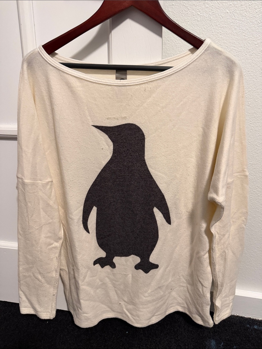Go Couture Cream Off-Shoulder Sweater with Black Penguin Graphic